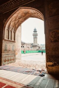 a person outside of a mosque